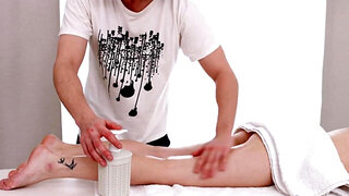 Bella Gray is massaged and screwed from behind by the masseuse