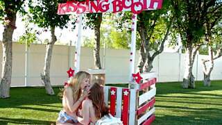 Lezzie blonde model fingers pussies by the kissing booth