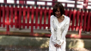 Shy Japanese cutie gets fingered in hot spring POV