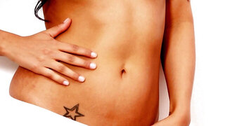 A bimbo with small tits is massaging her wet pussy lips today