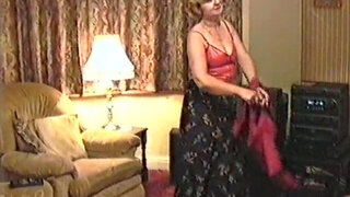 Mature tenderly dances and strips down on camera