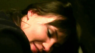 A raven haired bitch is getting a dick in her ass and in her mouth