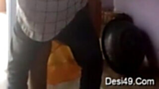 Sly hubby fucks and records Indian wife in the kitchen