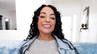 Brunette woman with curly hair stars in a hot XXX video