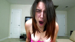 A sexy lady smiles while on her knees, sucking dick, swallowing semen