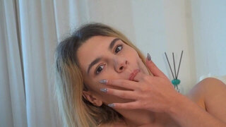 Blonde teen plays with her wet cherry in dazzling solo scenes