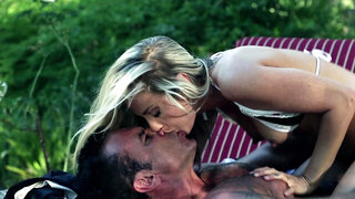 A big dude that has a long cock is punishing a hot blonde
