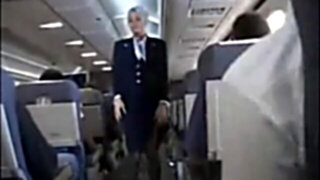 Stewardess fellates shaft on flat
