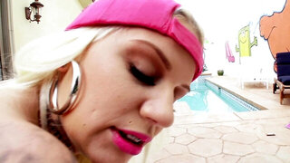 A blonde with a pink hat is exposing her tight pink pussy lips