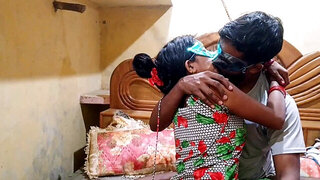 Masked woman and her hubby fucking in doggy style