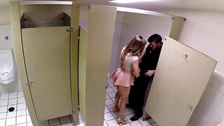 Slut in a miniskirt has a vigorous quickie in a public bathroom