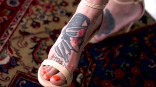 A tattooed babe is fucked by a lanky, hung dude