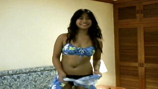 Exotic woman posing for the tourist in a vintage vid