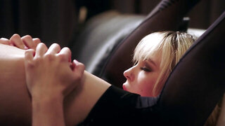 Blonde's tongue flicked against the excited clit of a hairy pussy