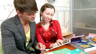 A brunette with pigtails shows us how she caresses a dick