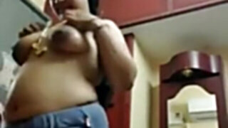 Indian BBW changes her clothes in front of a camera