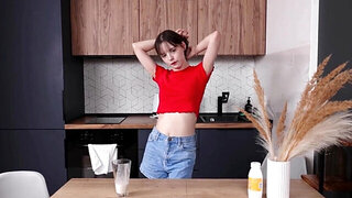 Tight girl showing off in a food fetish solo scene