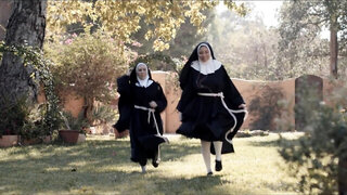 Lesbian nuns get freaky with each other outdoors