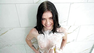 Flexible girl gets hot with a hard nice boner after shower