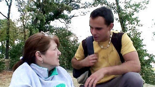 Mature redheaded lady ends up taking his huge penis