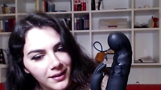 Horny brunette Valentina Nappi is playing with a curved dildo