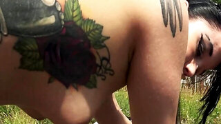 Gothic girl Doreen Darlin sucks a cock and fucks outside