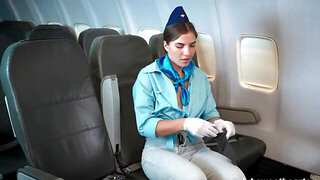 Stewardess removes her outfit after being alone in a plane