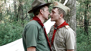 Scoutmaster is having bareback sex in the woods with a lad