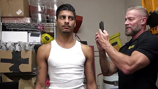 Tall bearded man with a great body catching a thief