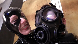 MILF in latex suit makes slave with gas mask cum with vibrator