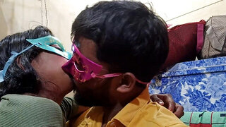 Indian husband making a nice show with the masked wife