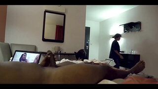 Guy is jerking off while the housekeeper is cleaning