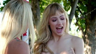 Lezzie blonde model fingers pussies by the kissing booth